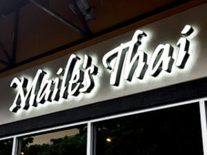 Maile's Thai sign using halo illumination lighting